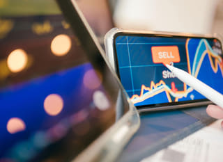Trader working across multiple markets reviewing forex options alongside Bitcoin and Ethereum